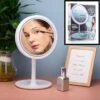 Merkloos Decopatent® Beauty Breeze Mirror - Make-Up Spiegel Met LED Verlichting & Ventilatie - 360° Draaibaar - Make Up 5x Vergrootspiegel